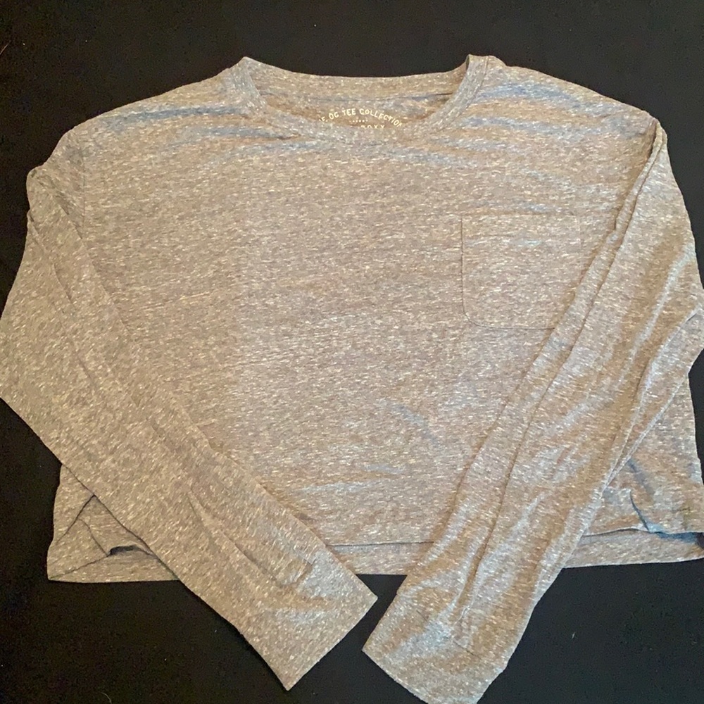 Cropped long sleeve. Worn a couple of times but still in good condition